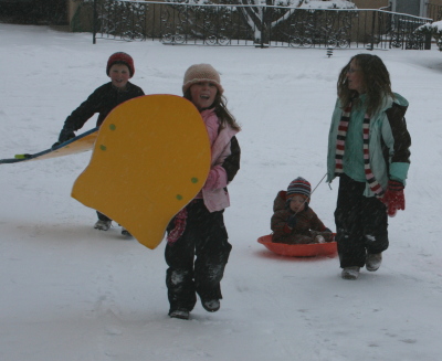 Pictures Of Kids Sledding. big december snow - sledding